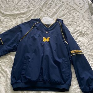 Mens Michigan athletes wind breaker jacket size XL.